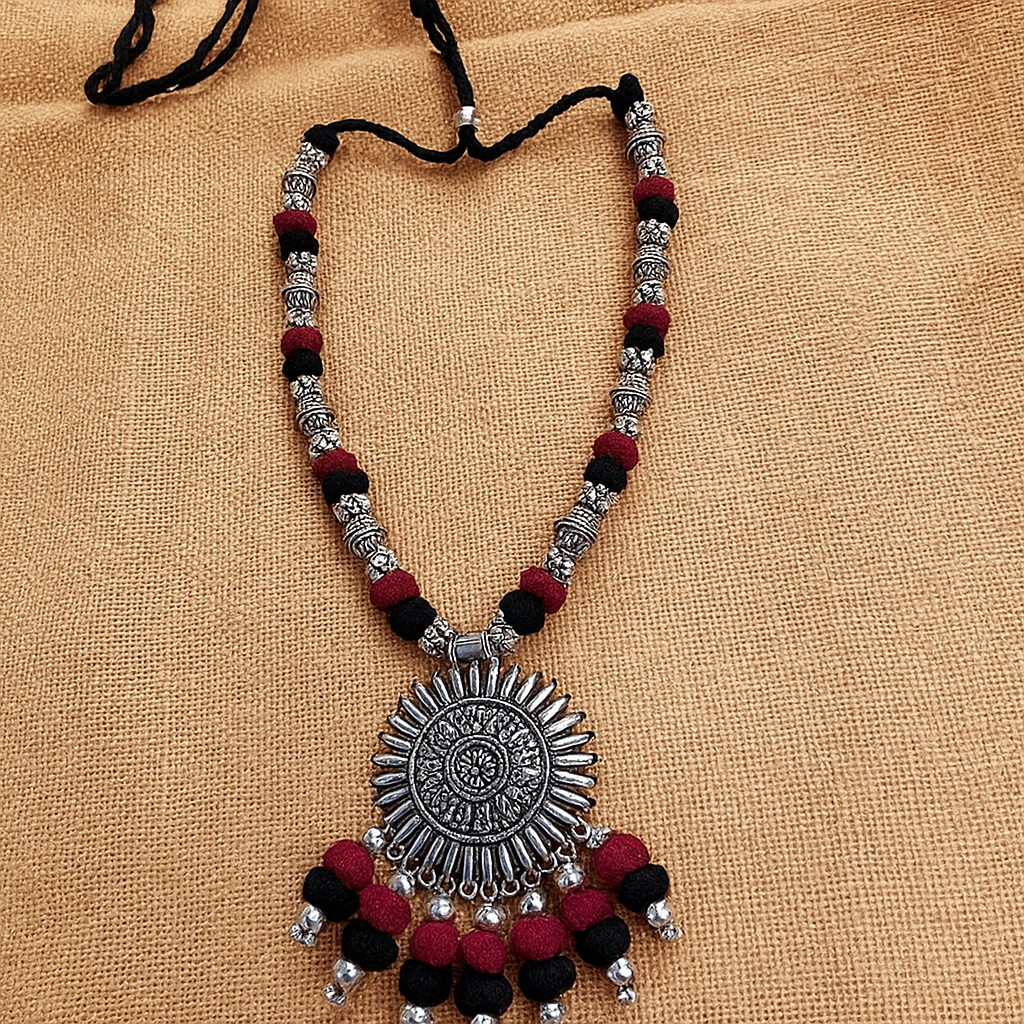 Antique Oxidized Necklace with Sun Pendant – Black & Maroon Thread Work